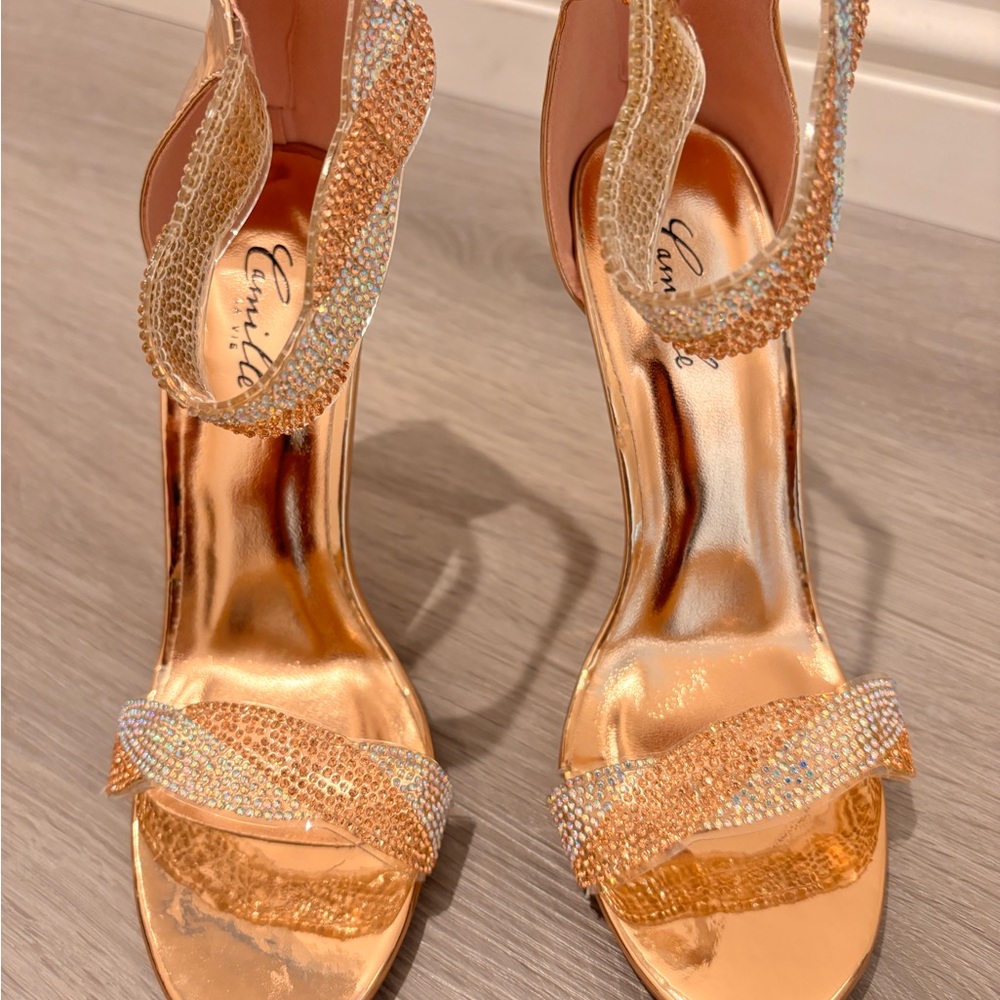 2 items.  1. Heels. Good condition. 2. Black sandals.